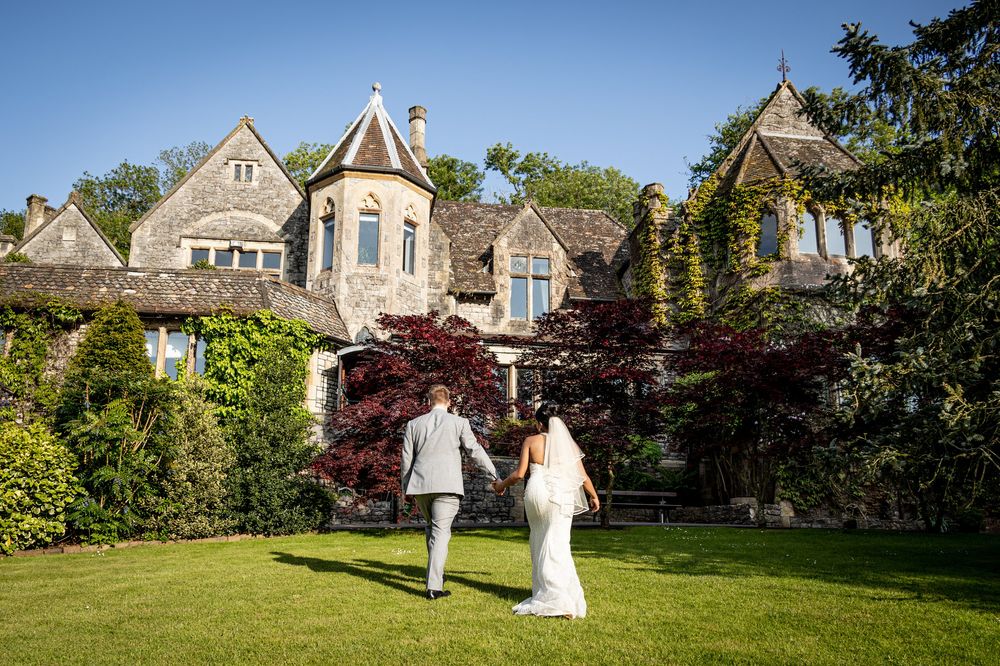 The Best UK Dry Hire Wedding Venues Couple walking back to the great room 8