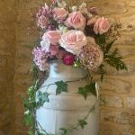 wick farm milk churn flowers.jpg