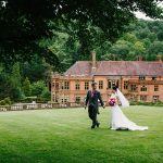 Wedding bride and groom in gardens of Marden Park mansion, Surrey wedding venue