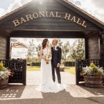 Bride & groom – baronial archway.jpg