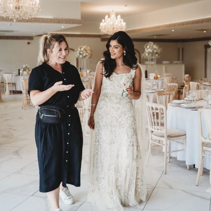 Wedding coordinator helping bride
